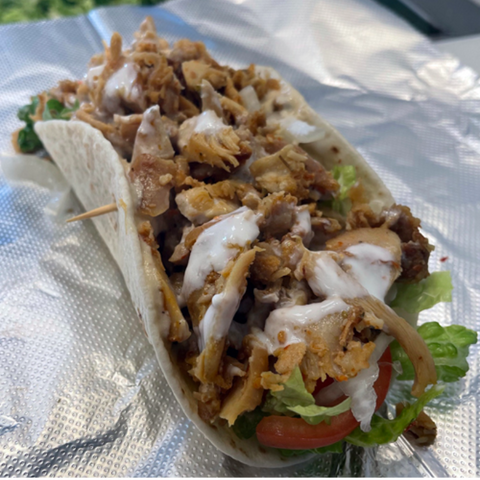 Pita Pocket food truck angle view with shawarma and falafel branding